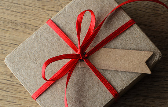 Gift box with red ribbon